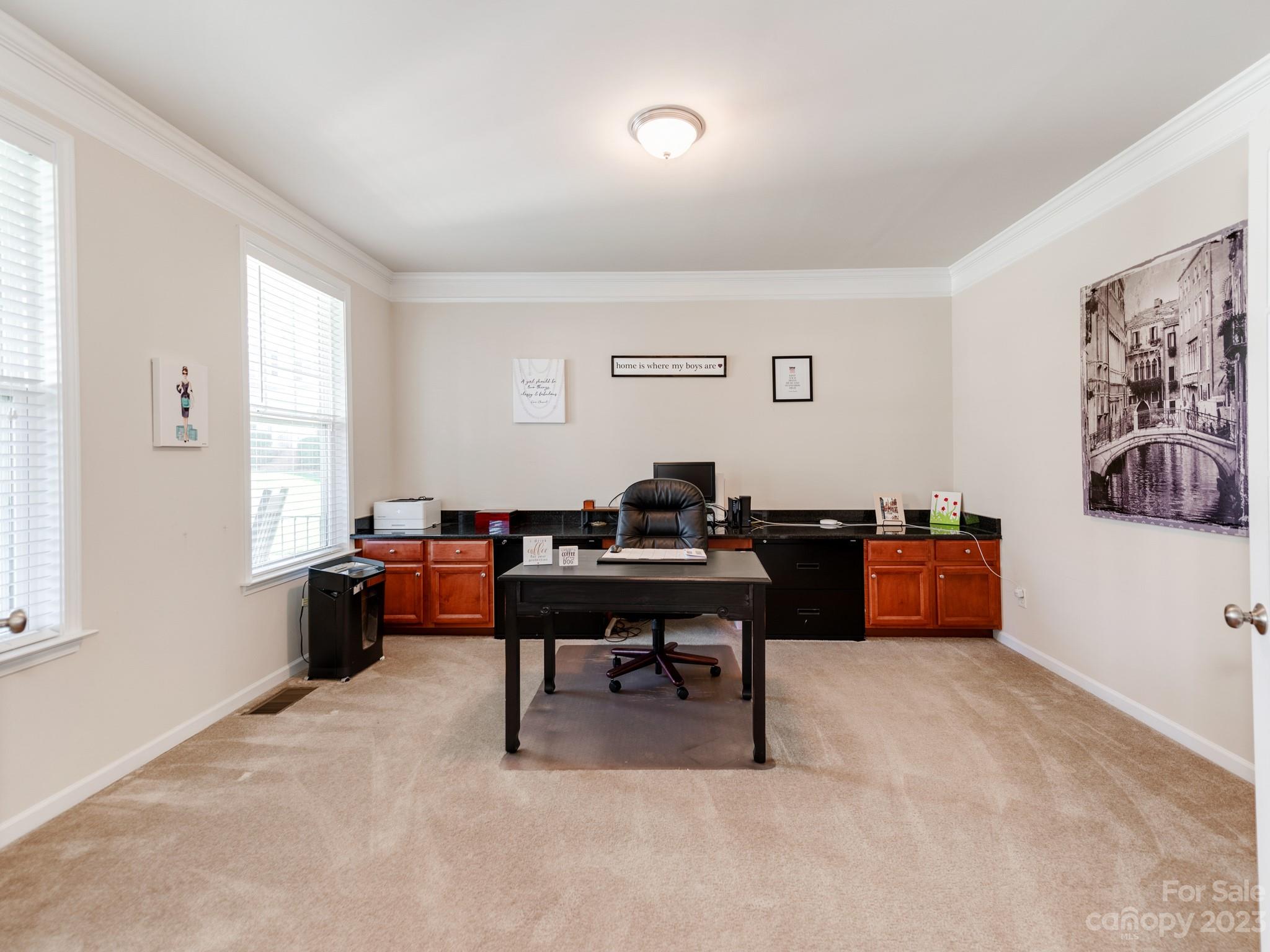 1603 Randwick Way Matthews, NC 28104 - Photo 10 of 48 a livingroom with workspace and a window