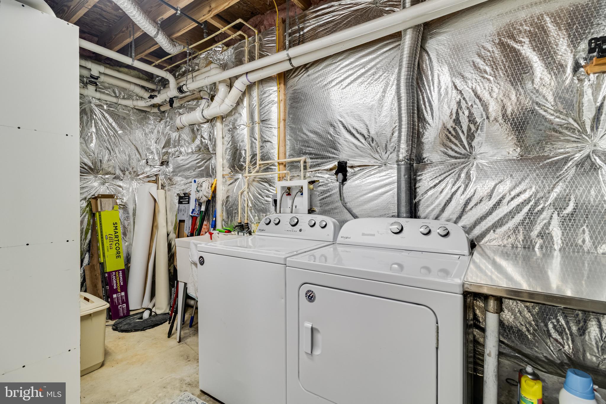 12015 Woodbury Road Nanjemoy, MD 20662 - Photo 46 of 53 a utility room with dryer and washer
