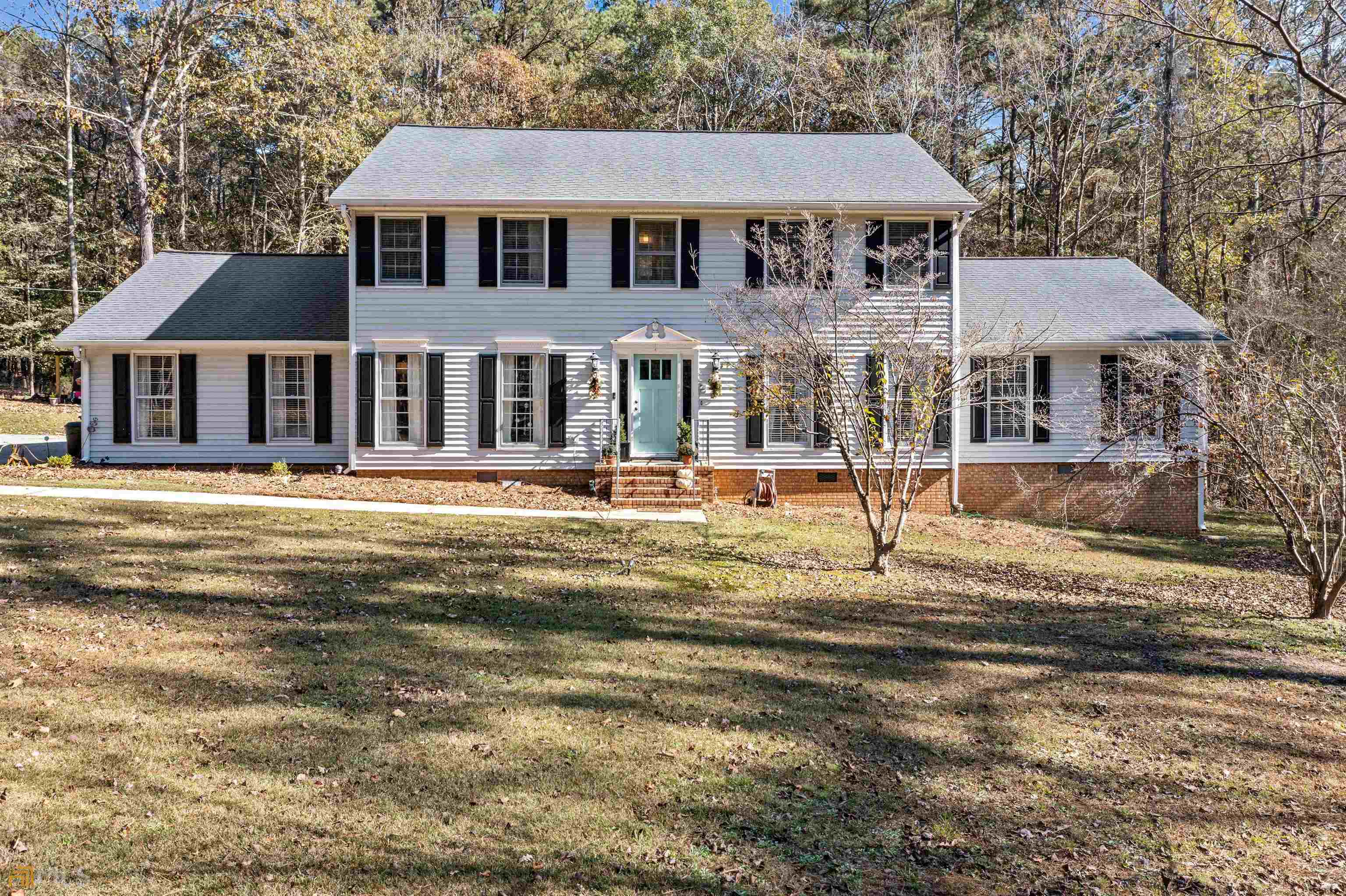 69 River Lane Southwest Rome, GA 30165 - Photo 1 of 1 a front view of a house with a patio