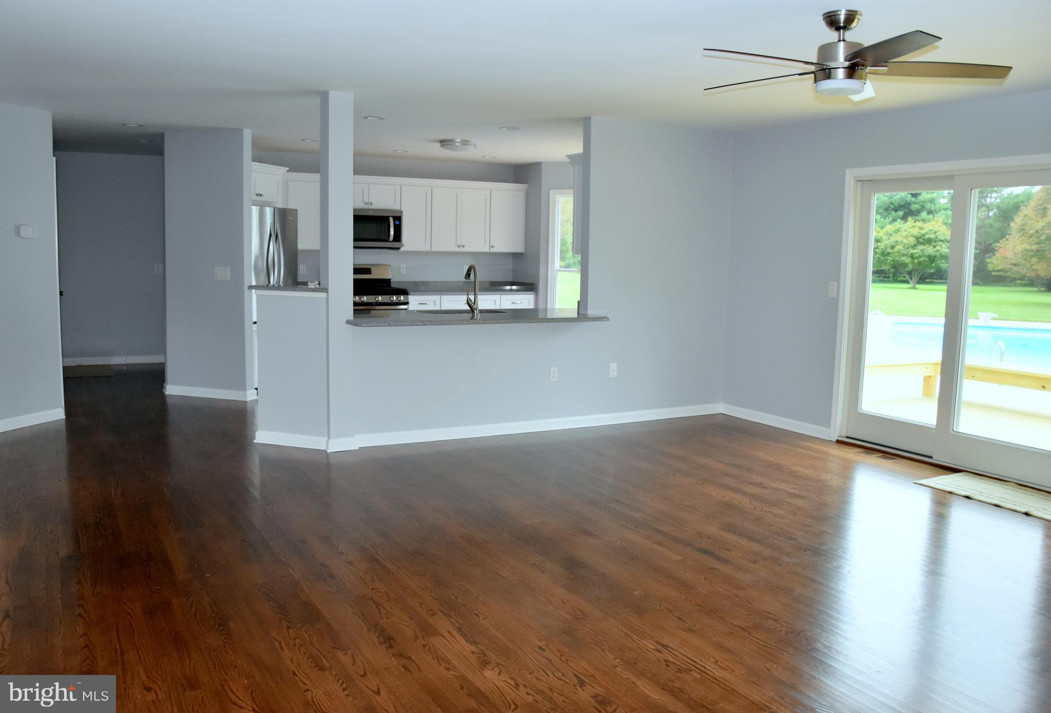 8569 Northbend Road Easton, MD 21601 - Photo 11 of 29 Great room to kitchen view