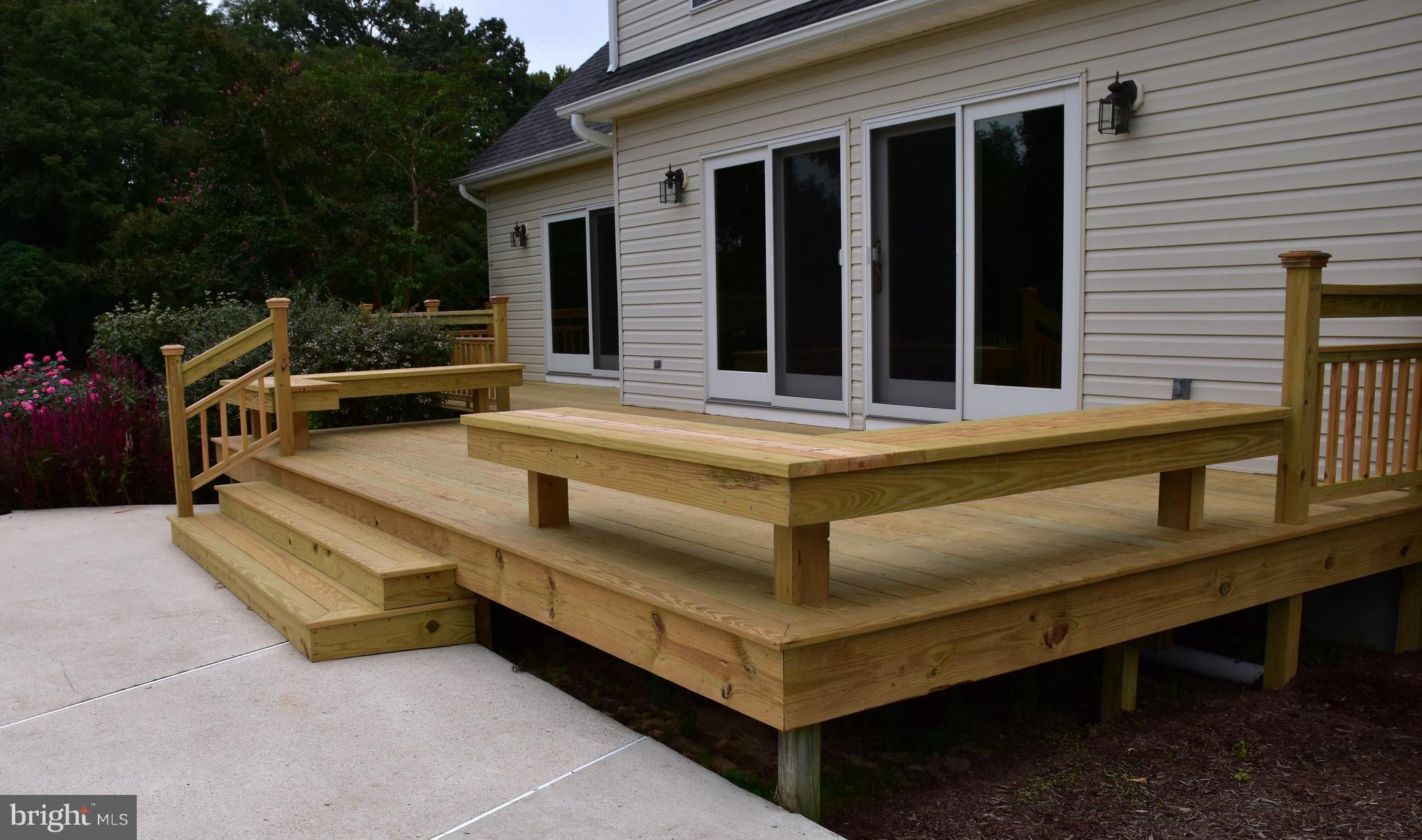 8569 Northbend Road Easton, MD 21601 - Photo 28 of 29 Rear Deck with bench seating