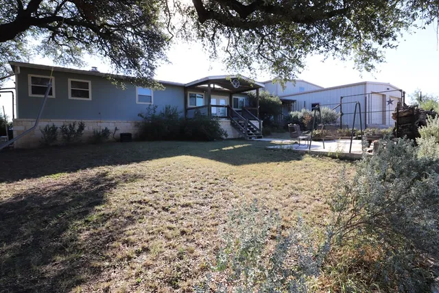 a view of outdoor space and barbecue grill