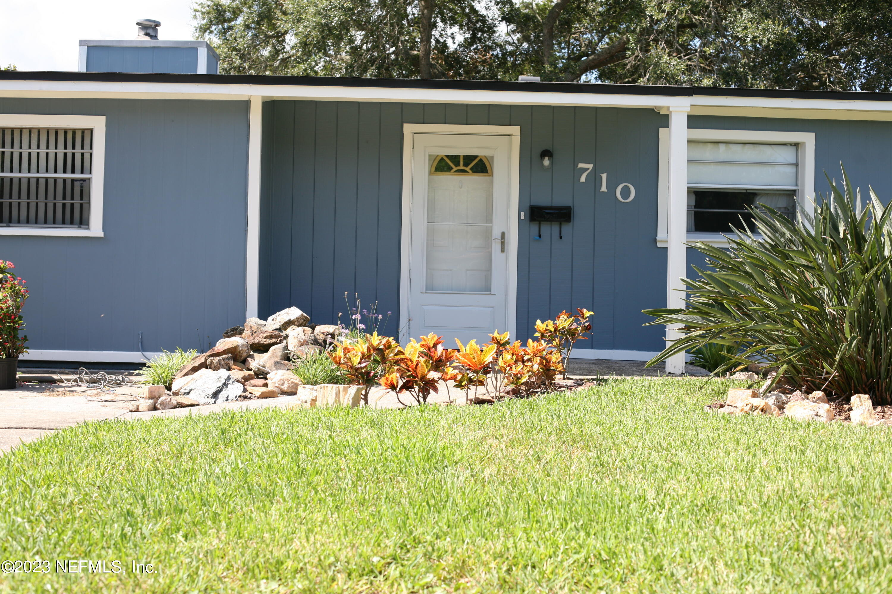a front view of a house with an outdoor space