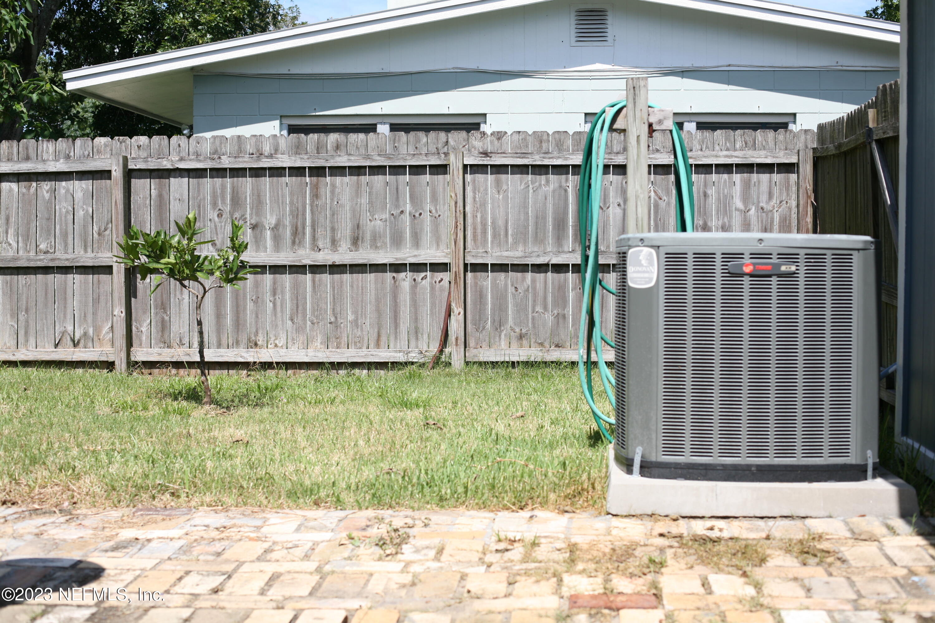 710 Redfin Drive Atlantic Beach, FL 32233 - Photo 34 of 38 a backyard of a house with lots of green space