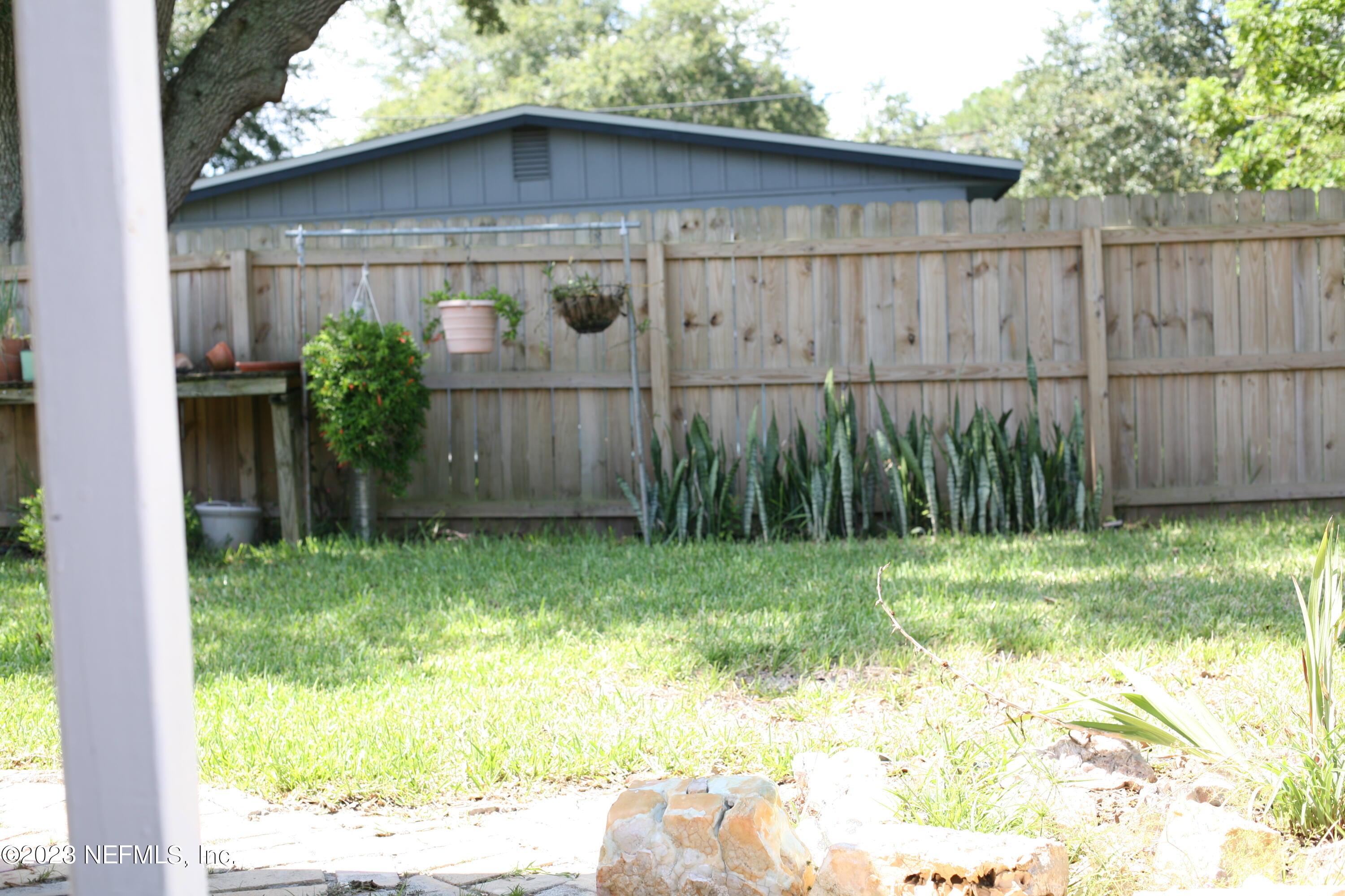710 Redfin Drive Atlantic Beach, FL 32233 - Photo 35 of 38 a backyard of a house with lots of green space