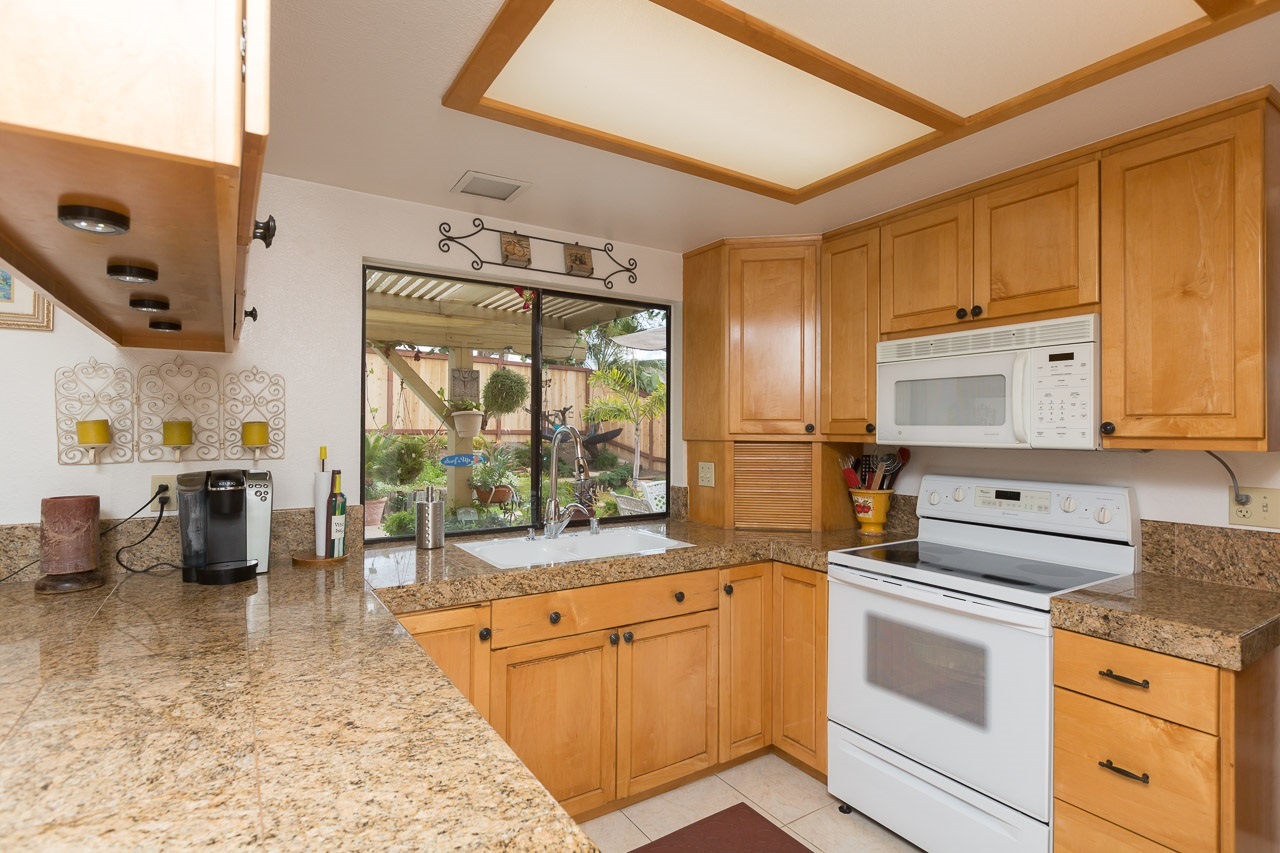 4626 Waverly Road Oceanside, CA 92056 - Photo 6 of 14 large window slides open for access to backyard patio/pool