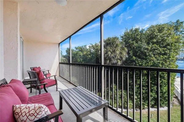 a balcony with chairs