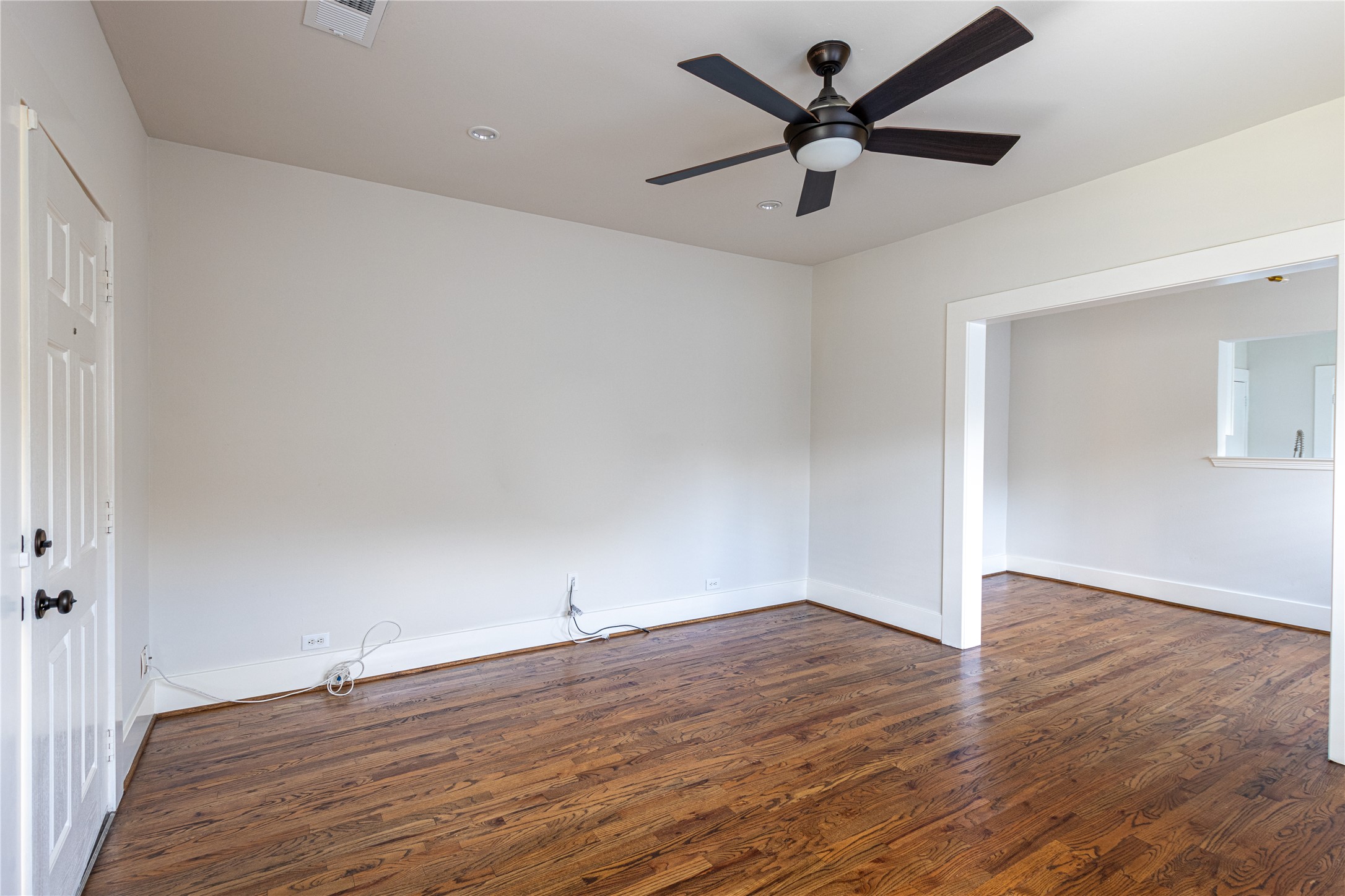 2009 Singleton Street Houston, TX 77008 - Photo 8 of 24 wooden floor in an empty room