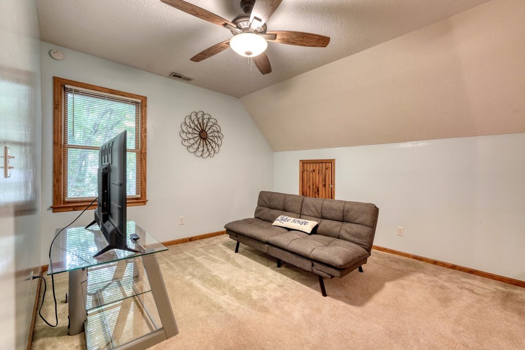 3739 Pat Colwell Road Blairsville, GA 30512 - Photo 24 of 55 a living room with furniture and a flat screen tv