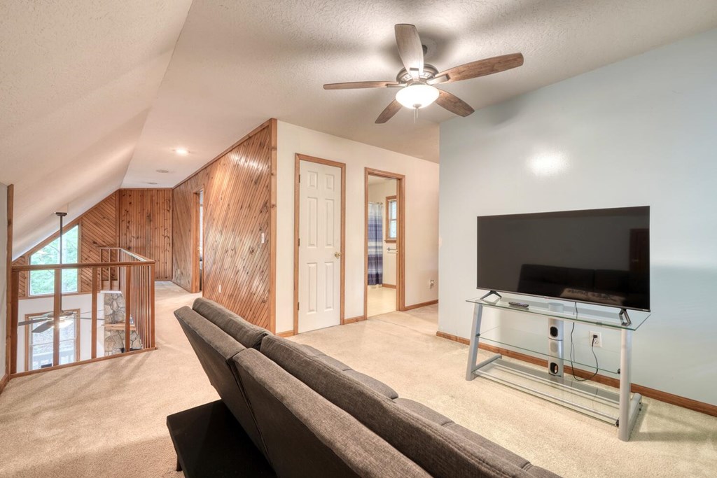 3739 Pat Colwell Road Blairsville, GA 30512 - Photo 25 of 55 a living room with furniture and a flat screen tv