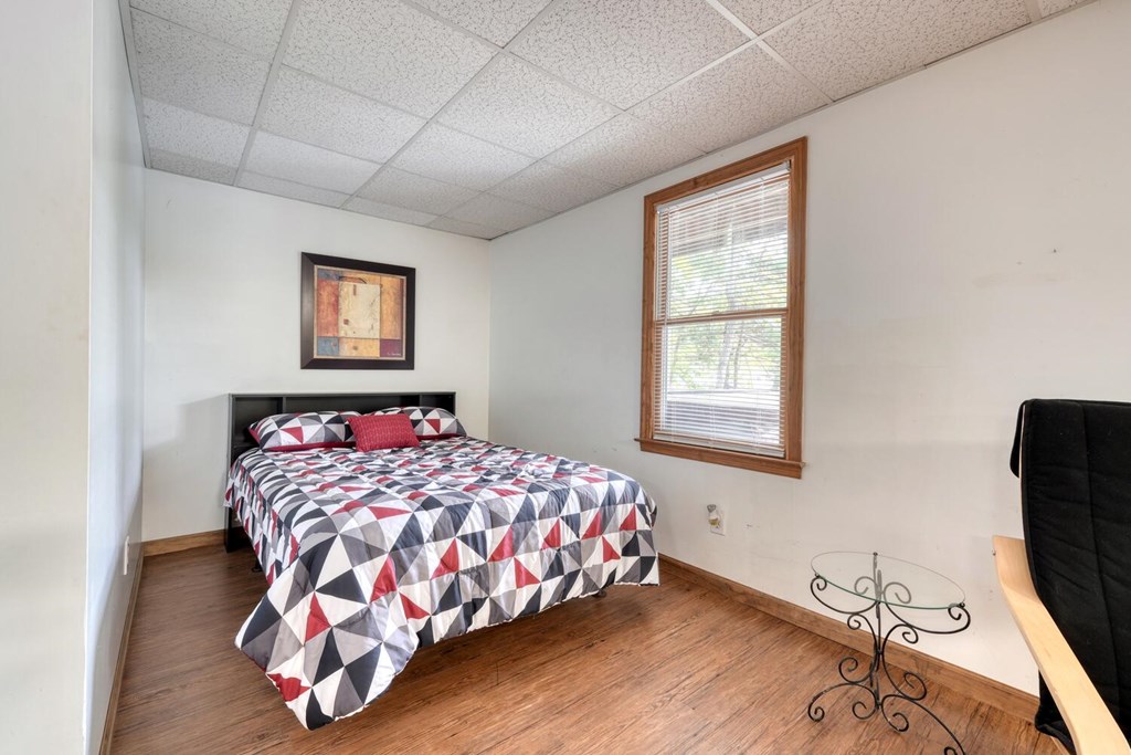 3739 Pat Colwell Road Blairsville, GA 30512 - Photo 34 of 55 a bedroom with a bed and a window