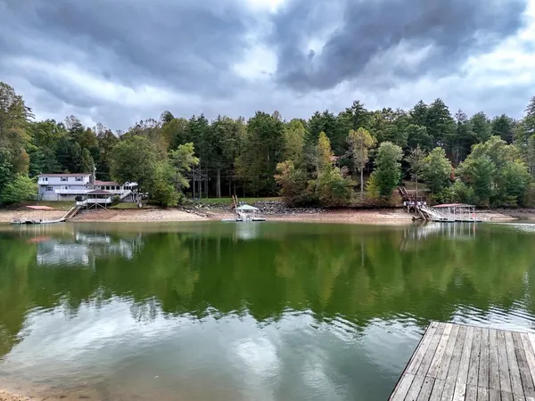 a view of a lake with a yard