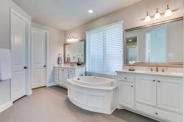 a view of a dining room with furniture wooden floor and chandelier