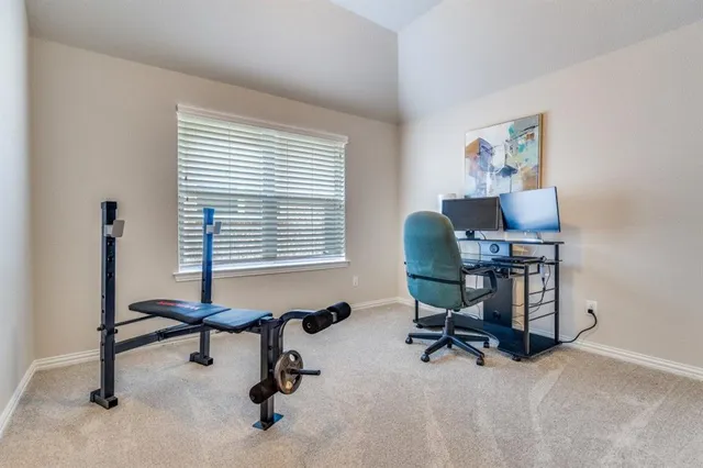 a bathroom with a granite countertop sink a toilet and bathtub