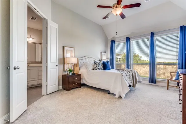 a kitchen with sink stove and wooden floor