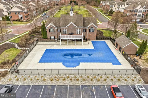 swimming pool view with sitting space