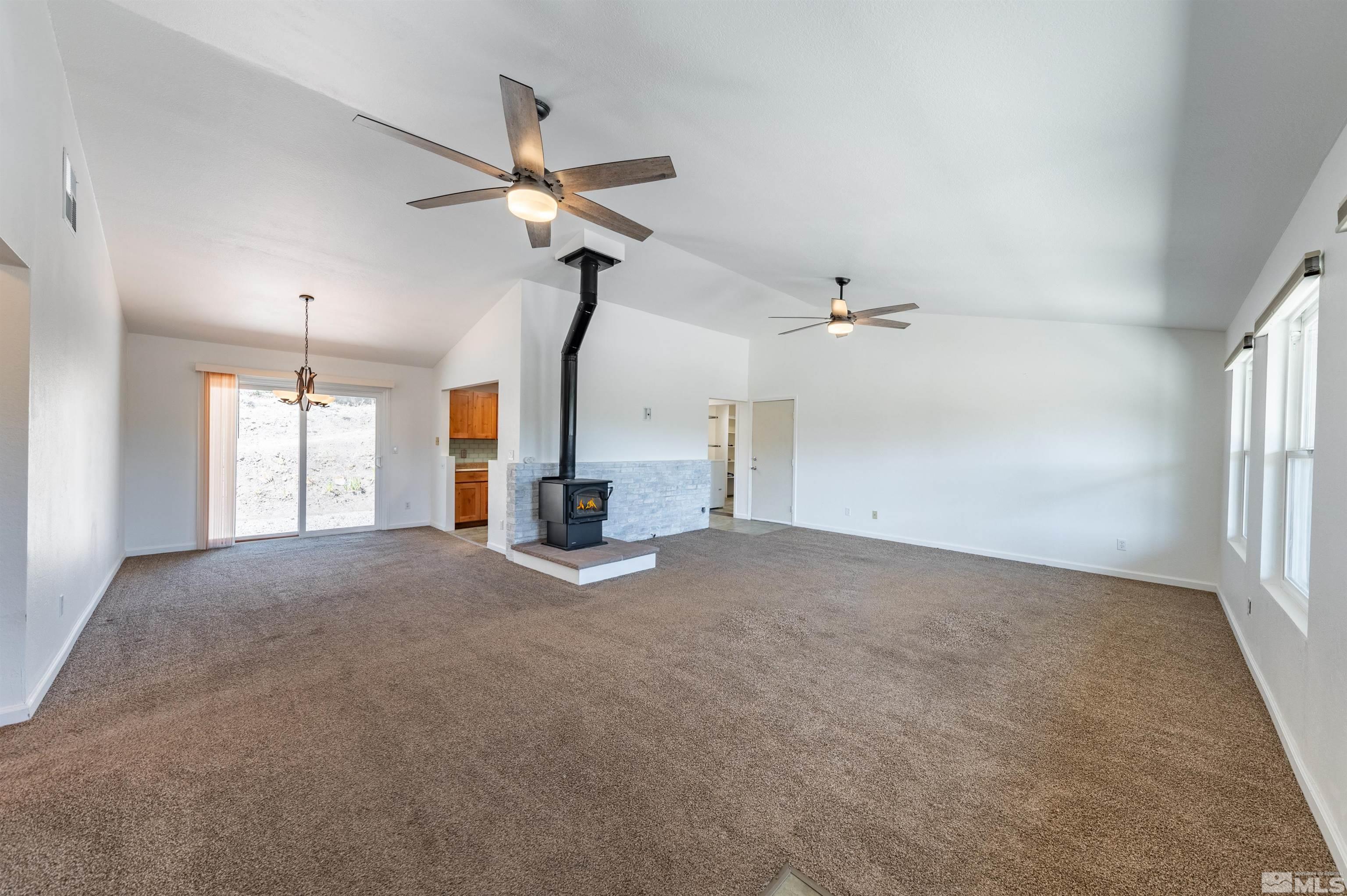 21940 Adobe Road Reno, NV 89521 - Photo 5 of 22 a view of empty room with a ceiling fan