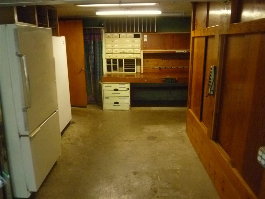 20 Swallow Hill Road Carnegie, PA 15106 - Photo 17 of 25 "Tool" room with lots of built in storage. Extra refrigerator and freezer stays with the house too.