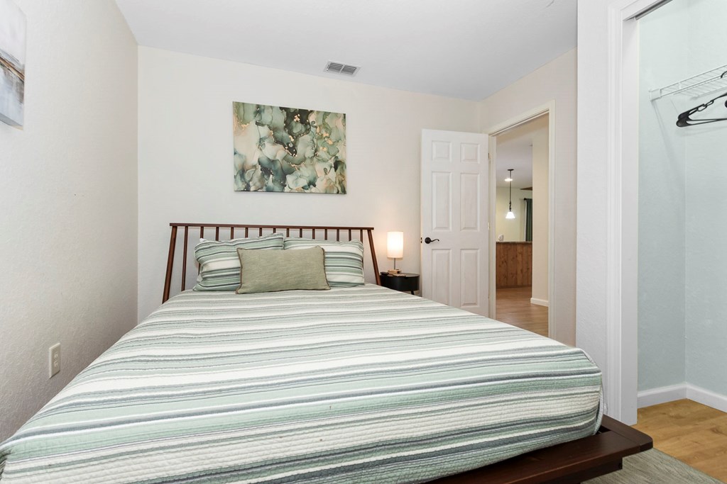 204 Hiawassee River Road Murphy, NC 28906 - Photo 13 of 79 a bedroom with a bed and painting on the wall