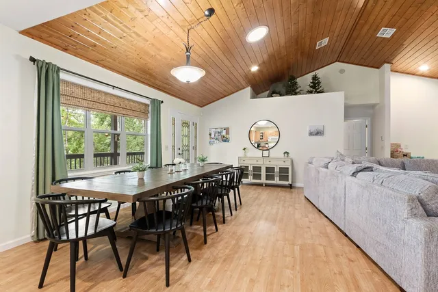 a living room with furniture or fireplace and a wooden floor