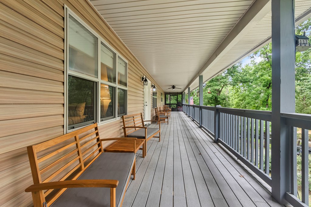 204 Hiawassee River Road Murphy, NC 28906 - Photo 29 of 79 a view of balcony with wooden floor and outdoor seating