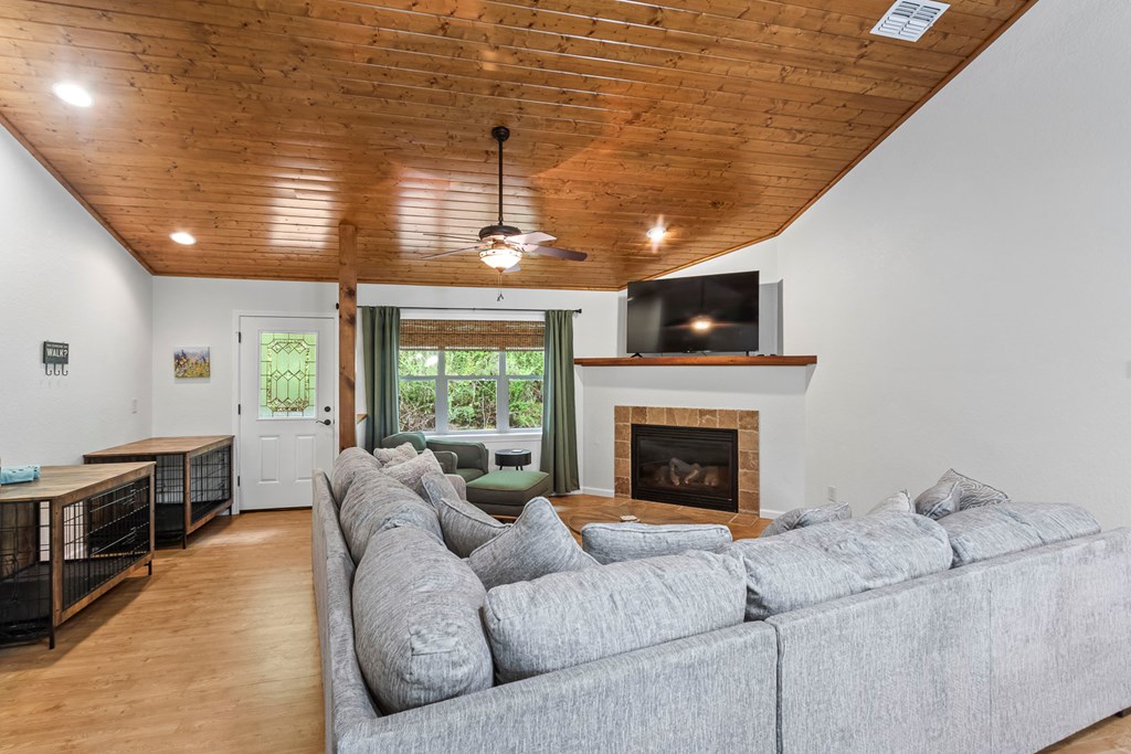 204 Hiawassee River Road Murphy, NC 28906 - Photo 38 of 79 a living room with furniture or fireplace and a wooden floor