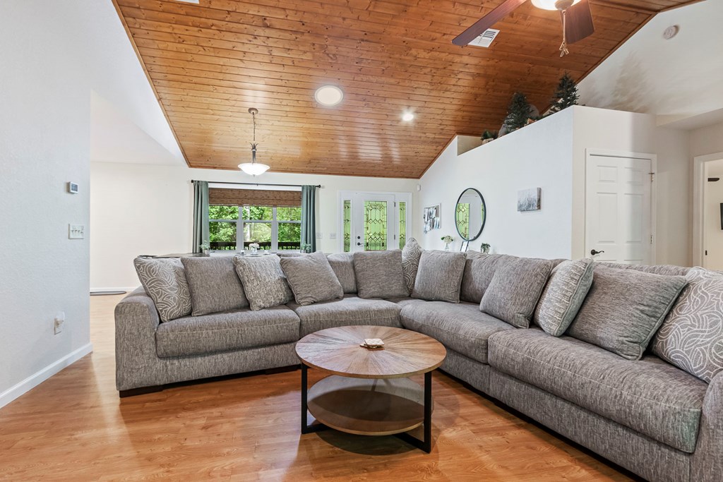 204 Hiawassee River Road Murphy, NC 28906 - Photo 42 of 79 a living room with furniture and a large window