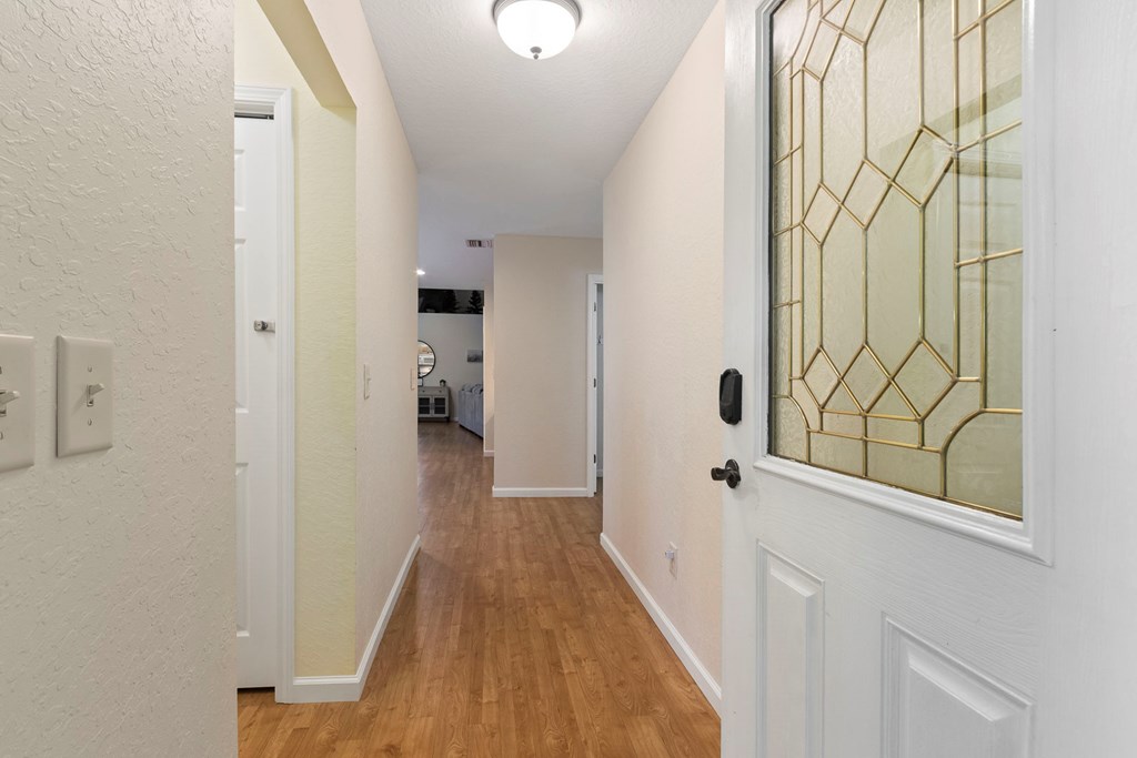 204 Hiawassee River Road Murphy, NC 28906 - Photo 6 of 79 a view of a hallway with wooden floor and staircase