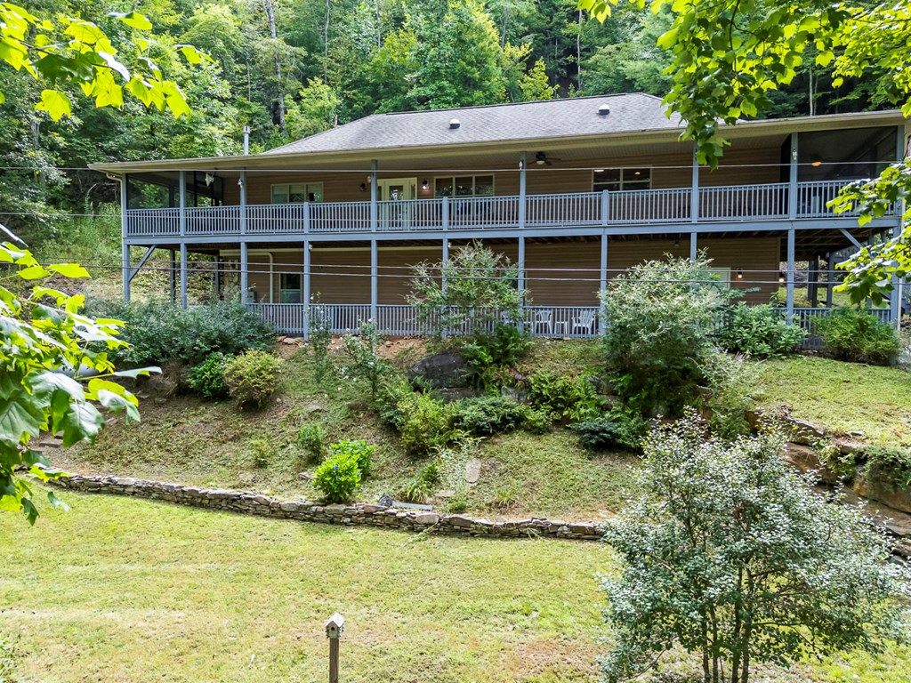 204 Hiawassee River Road Murphy, NC 28906 - Photo 70 of 79 a view of a house with pool and garden