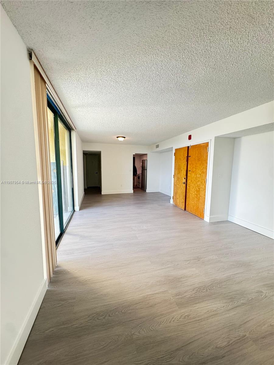 11780 Southwest 18th Street, Unit 5282 Miami, FL 33175 - Photo 19 of 19 a view of empty room with window