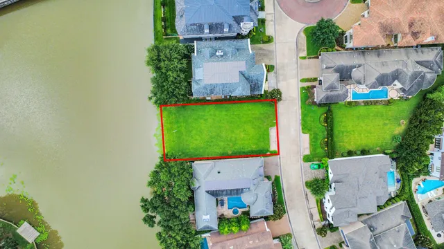 an aerial view of a house with a garden