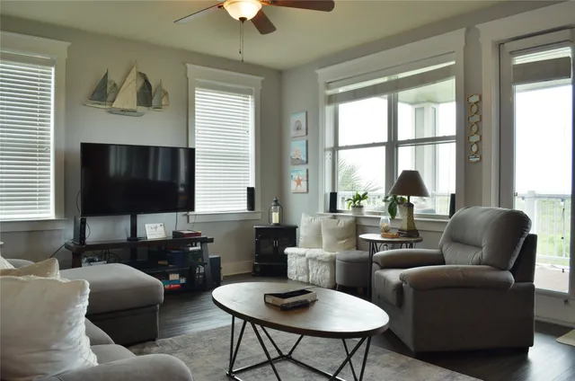 a kitchen with stainless steel appliances granite countertop a refrigerator stove a sink and a microwave