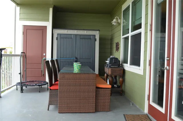 a bedroom with a bed and a table