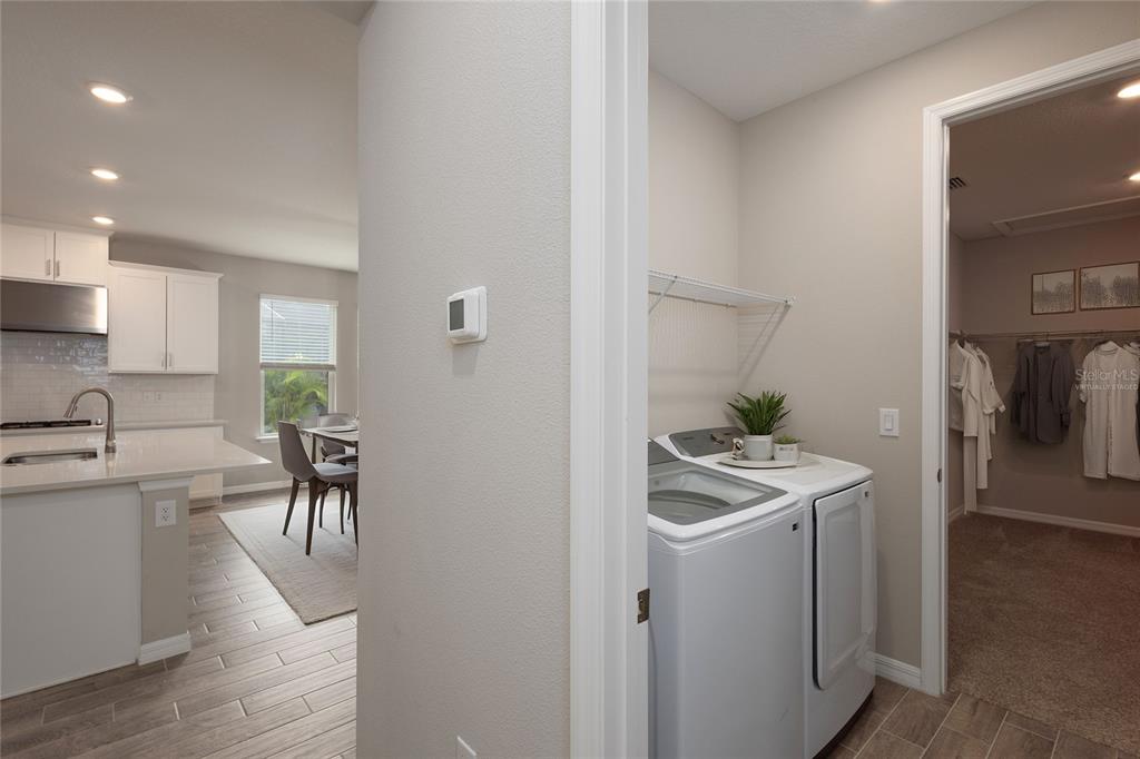 5604 Blue Reef Place Nokomis, FL 34275 - Photo 19 of 45 a room with furniture and a dining table