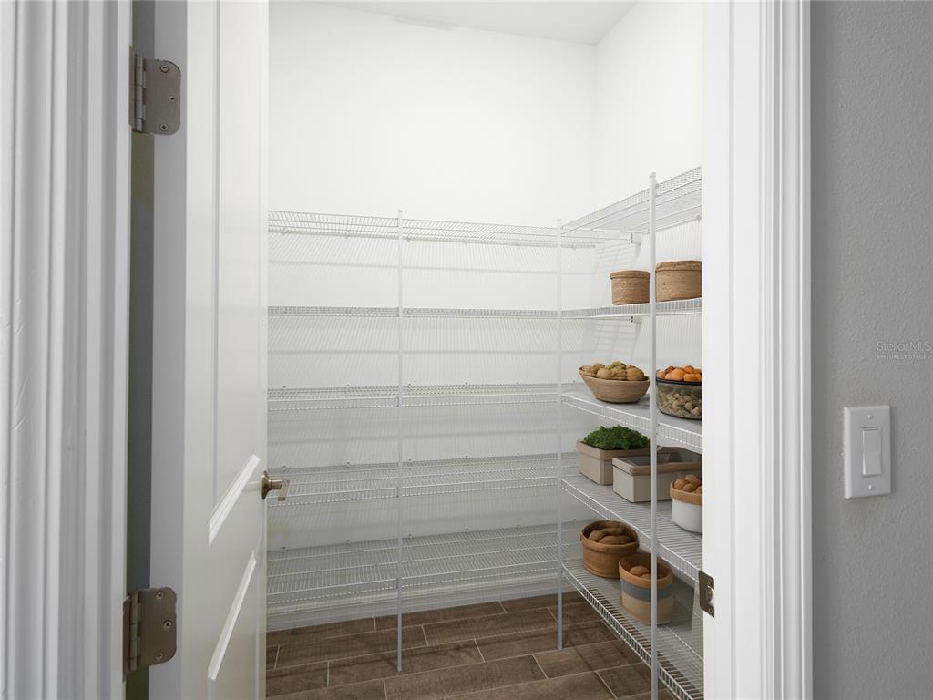 5604 Blue Reef Place Nokomis, FL 34275 - Photo 24 of 45 a view of walk in closet