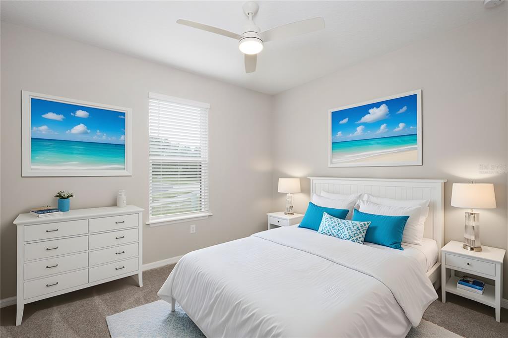 5604 Blue Reef Place Nokomis, FL 34275 - Photo 26 of 45 a bedroom with a bed and a window