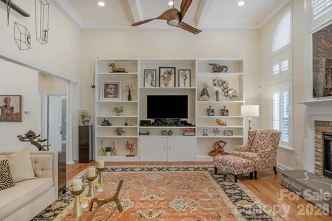 a bedroom with a large bed and a couch
