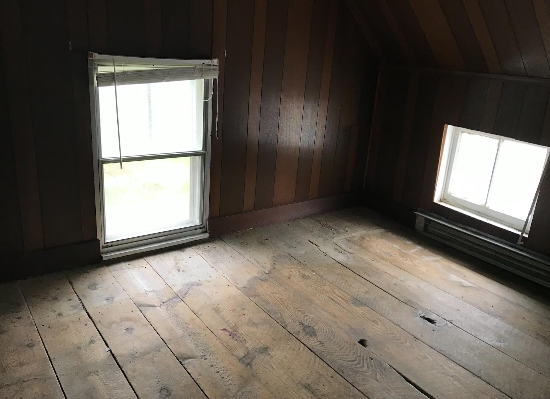 1145 Horse Ridge Road Northwest Willis, VA 24380 - Photo 29 of 29 a view of empty room with wooden floor and fan