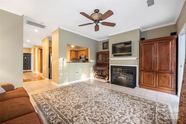 a kitchen with granite countertop a refrigerator and a sink
