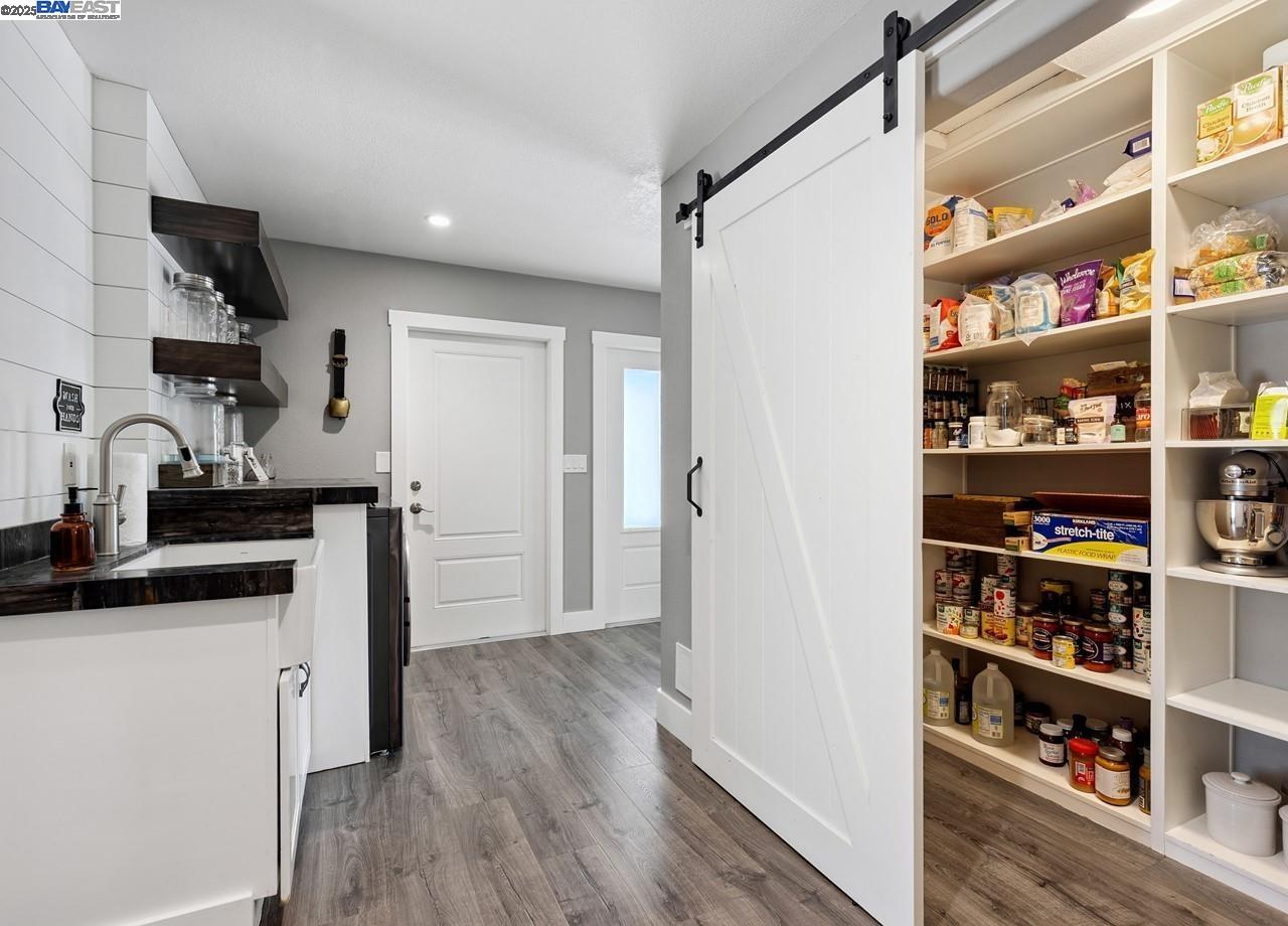 8191 Highland Road Livermore, CA 94551 - Photo 21 of 59 a kitchen with stainless steel appliances a refrigerator and a sink