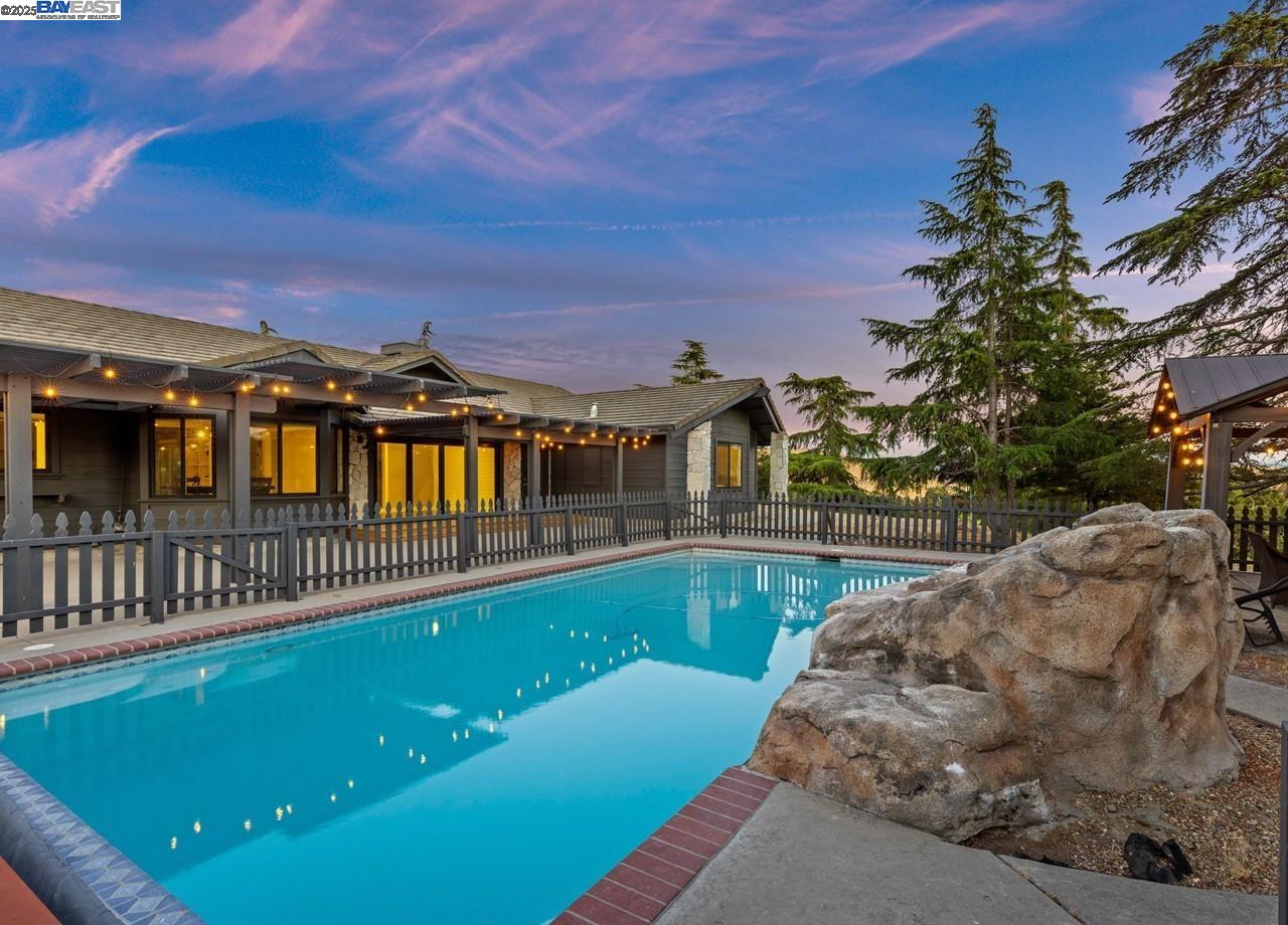 8191 Highland Road Livermore, CA 94551 - Photo 36 of 59 a view of a house with a swimming pool