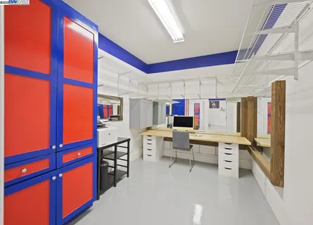 an aerial view of a house with a lake view