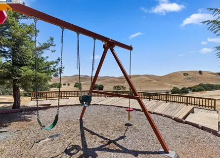 a view of a backyard with green space