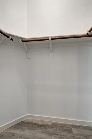 a view of a room with racks on the wall