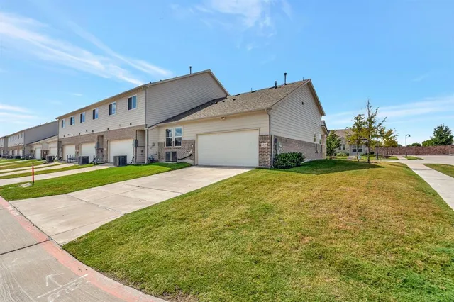 a view of a house with a big yard
