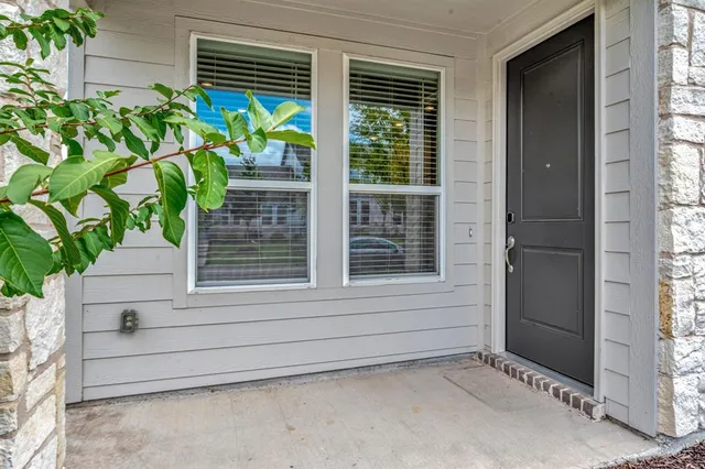 a view of front door with outdoor space