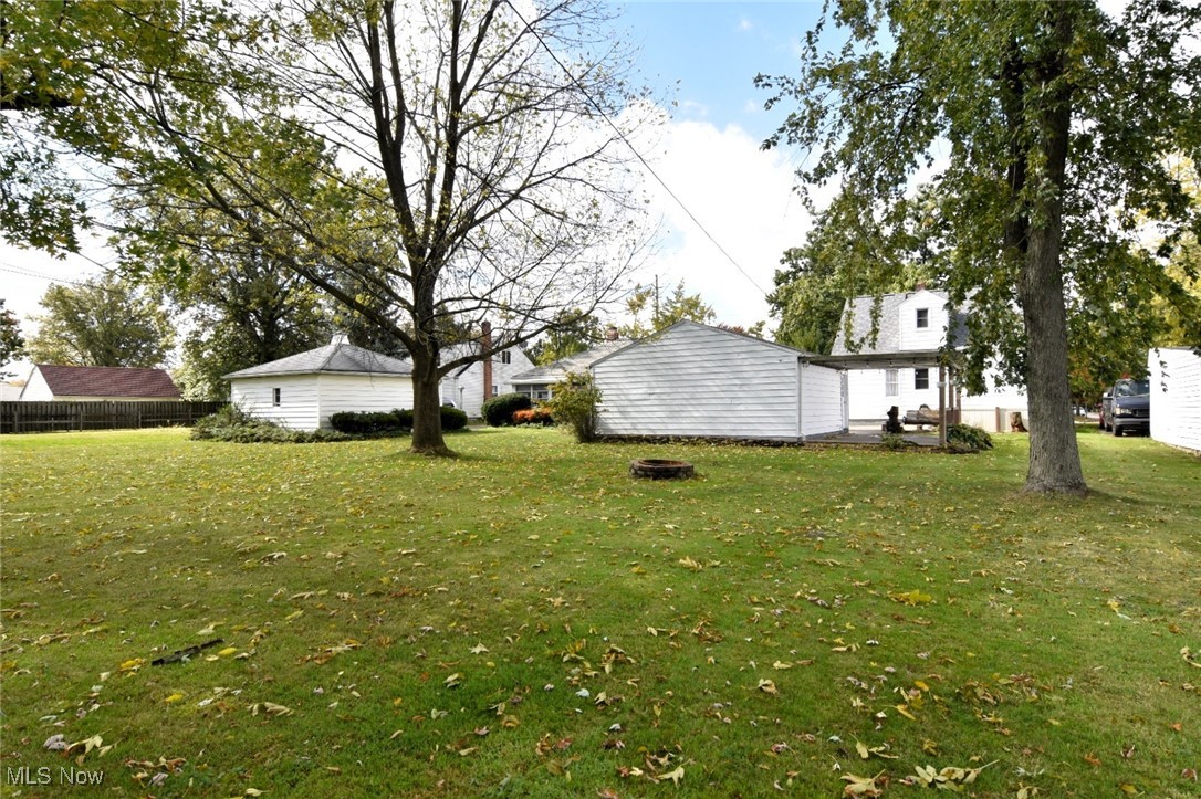 1575 Lander Road Cleveland, OH 44124 - Photo 45 of 49 View of yard featuring a fire pit