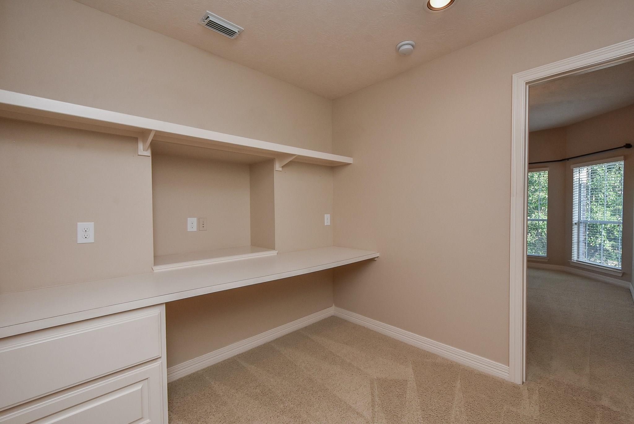 9722 Blue Cruls Way Spring, TX 77379 - Photo 33 of 49 Craft or study niche with built ins