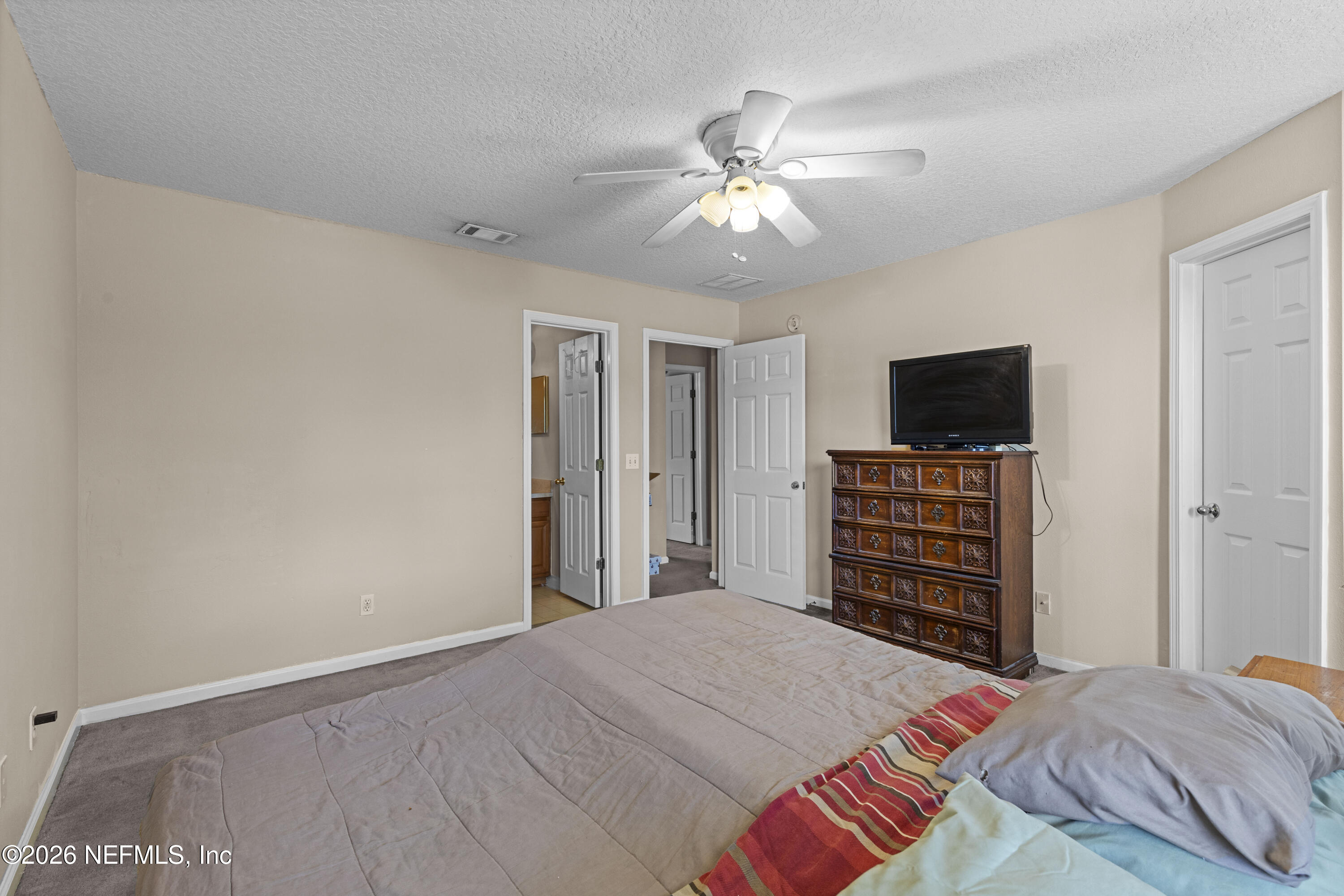 7774 Melvin Road Jacksonville, FL 32210 - Photo 24 of 32 23 Primary Bedroom - 2nd Floor