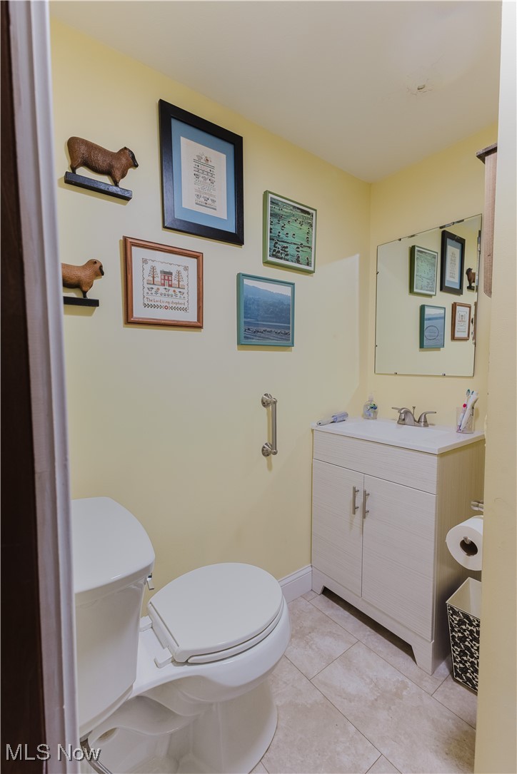 857 Archer Hill Road Colliers, WV 26035 - Photo 15 of 37 Bathroom featuring vanity and light tile patterned floors